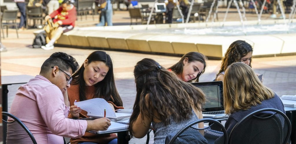 USC students studying at the USC Village Piazza